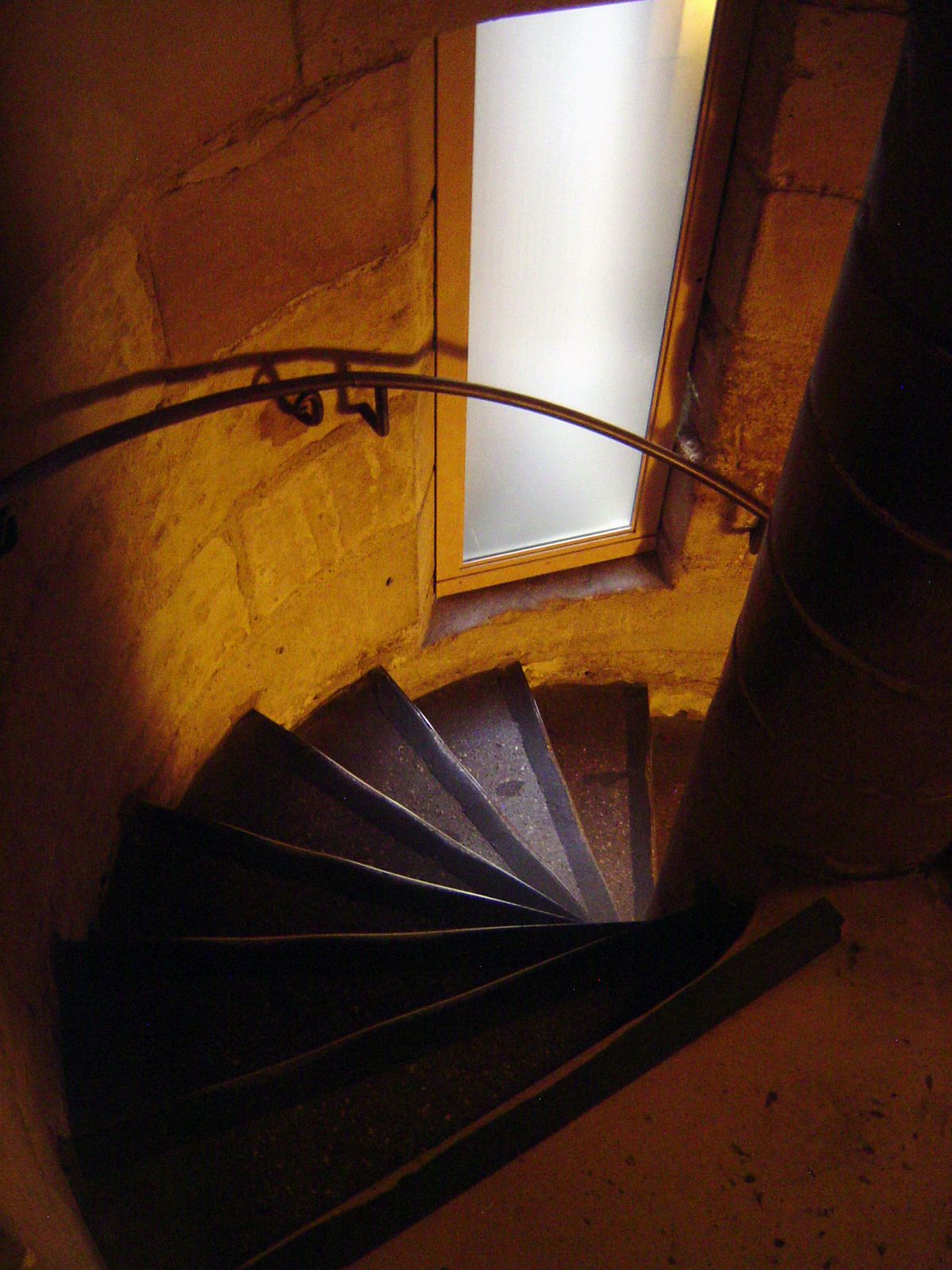 Louis entered straight from his apartment into the upper level, but visitors today use the spiral staircases from the lower level.