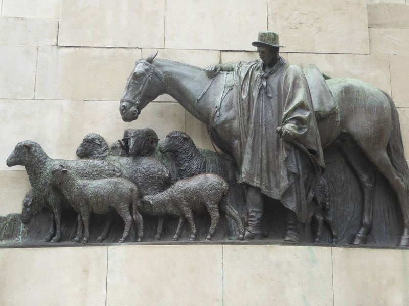 Bronzes on either side celebrate the country's archetypal industries. Sheep, alas, aren't what they were, here as in so many other places ar