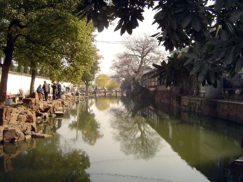 There aren't many—or perhaps any—working boats on Suzhou's canals today, which serve mostly a touristic purpose—here on the approach to one 