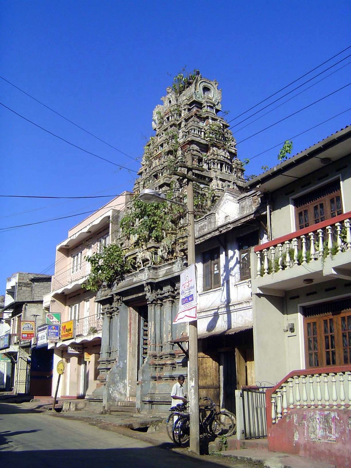They take us to this paint-deprived Hindu temple, built for the plantation-based Tamils.