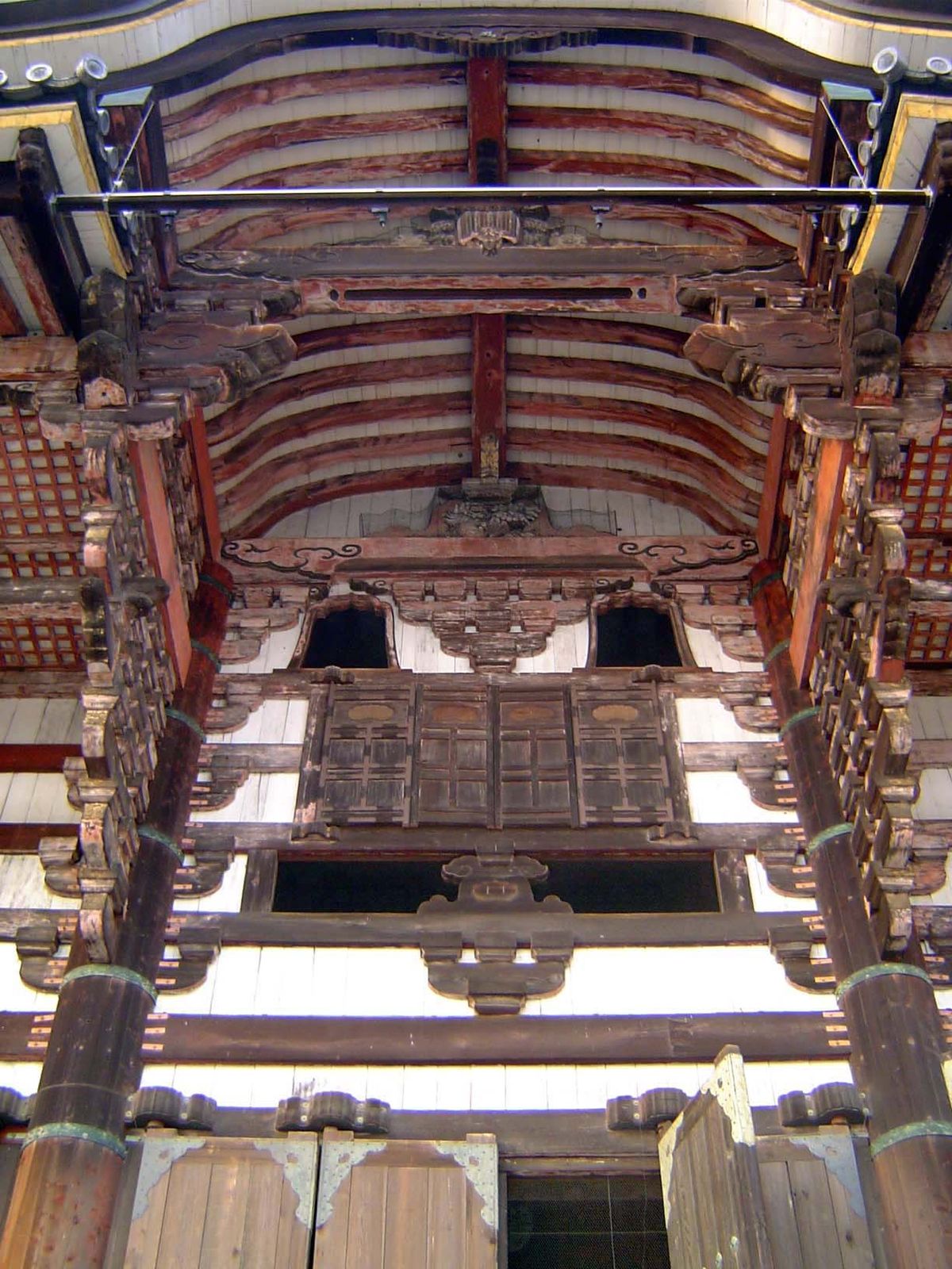Overhanging brackets at the entrance. The building is a reminder that without the arch or dome Japan relied on the post-and-lintel, strength