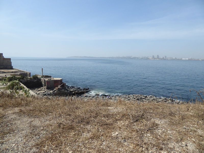 View from the fort toward Dakar. Cape Manuel, the southern tip of the Cape Verde Peninsula hook, is at the end of the land mass there. Head 