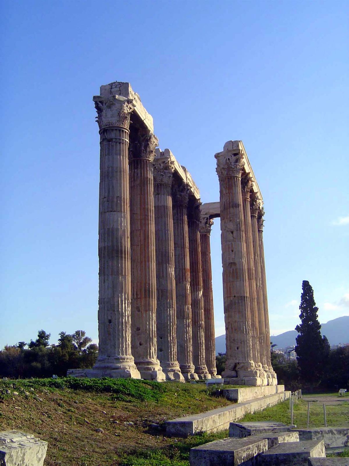 The columns are 55 feet high. Damaged in A.D. 267, the temple was then used as a stone quarry. Only 15 of 104 columns remain.