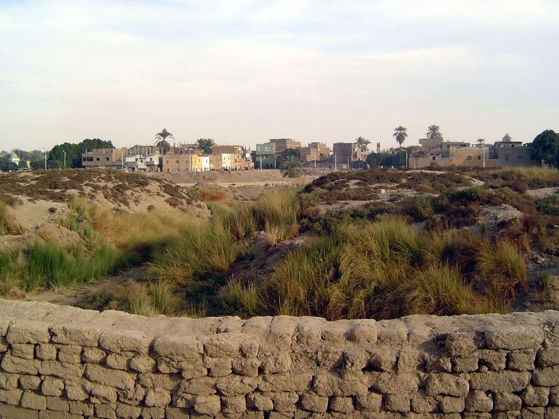 Looking east beyond the enclosure wall. Just dirt? Not quite: it's the remains of a temple built by Amenhotep IV or Akhenaten.