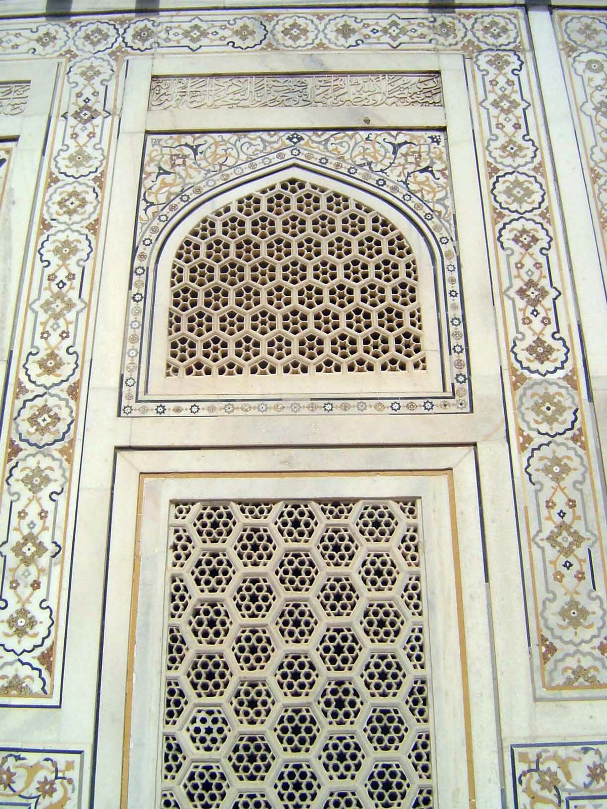 Close-up of a jali with surrounding inlay.