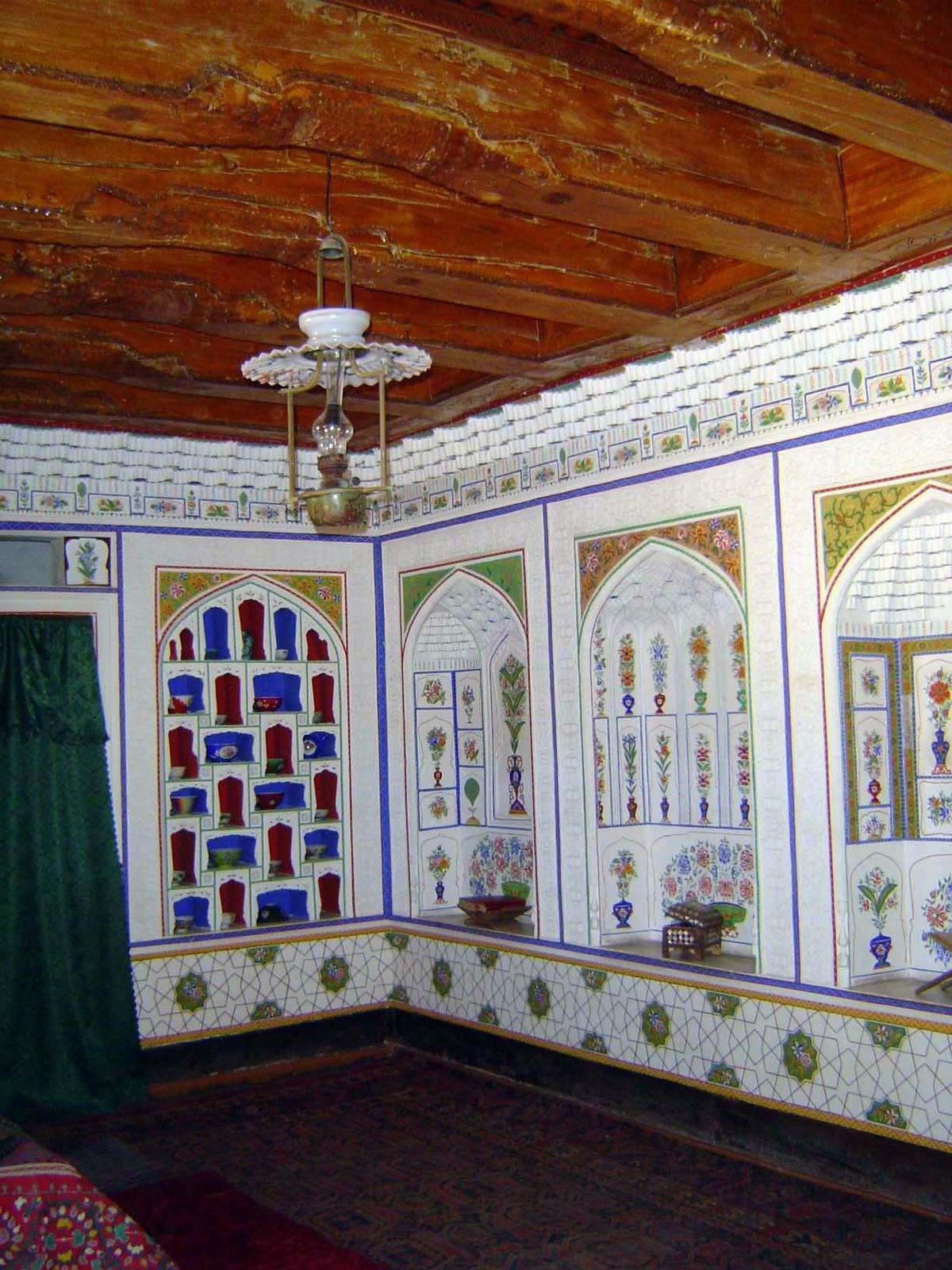 Here's an interior room with massive beams and the locally distinctive trim known as ganch, or carved and painted plaster.