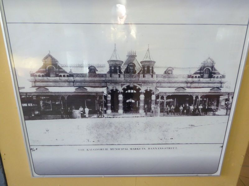 With a renovation in the 1980s, the market's end gables disappeared, along with the floating pediments on the awnings and the exposed brick 