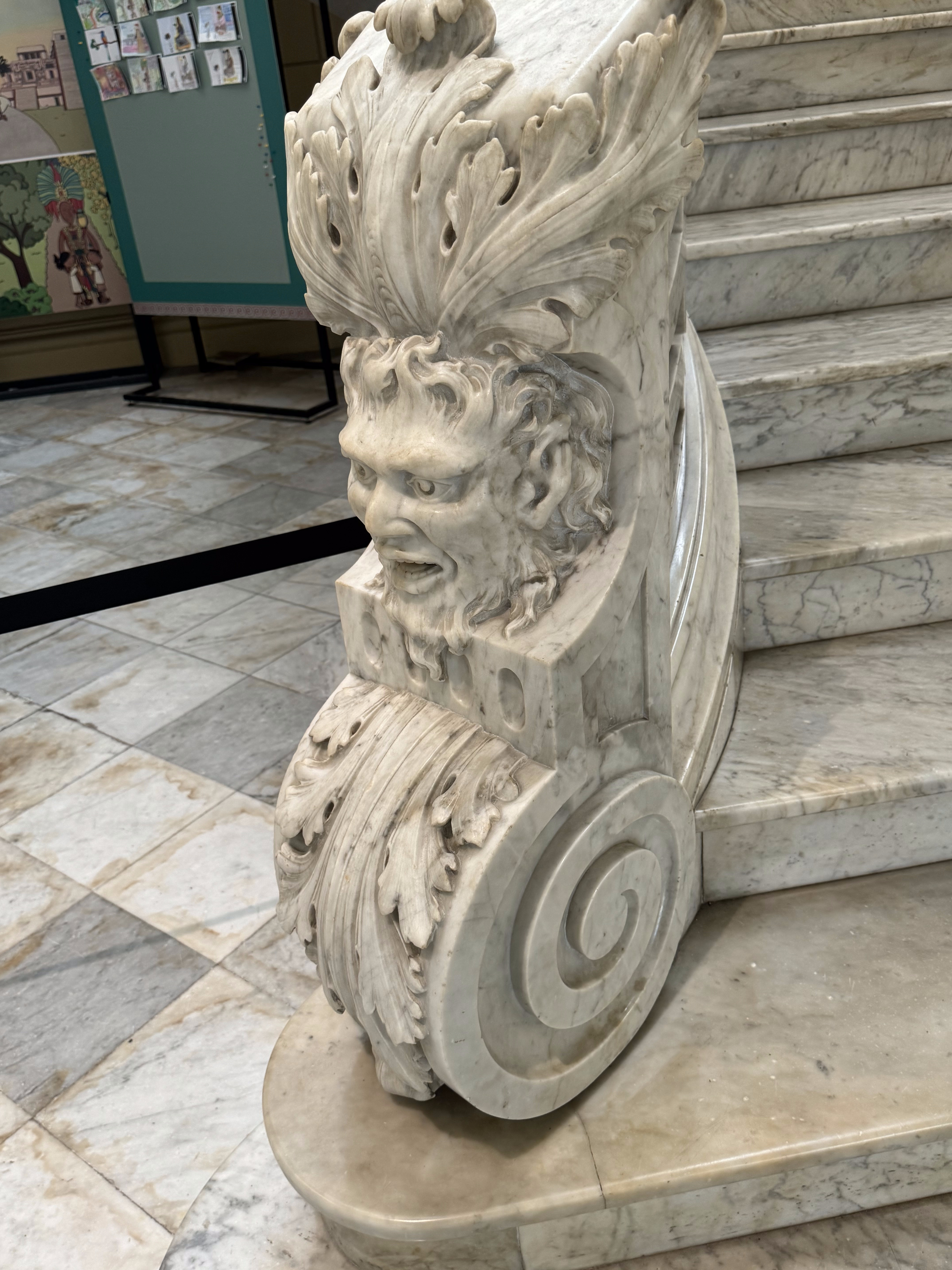 A bit of the home's presumably Italian marble.  I bet this newel post terrified little kids.