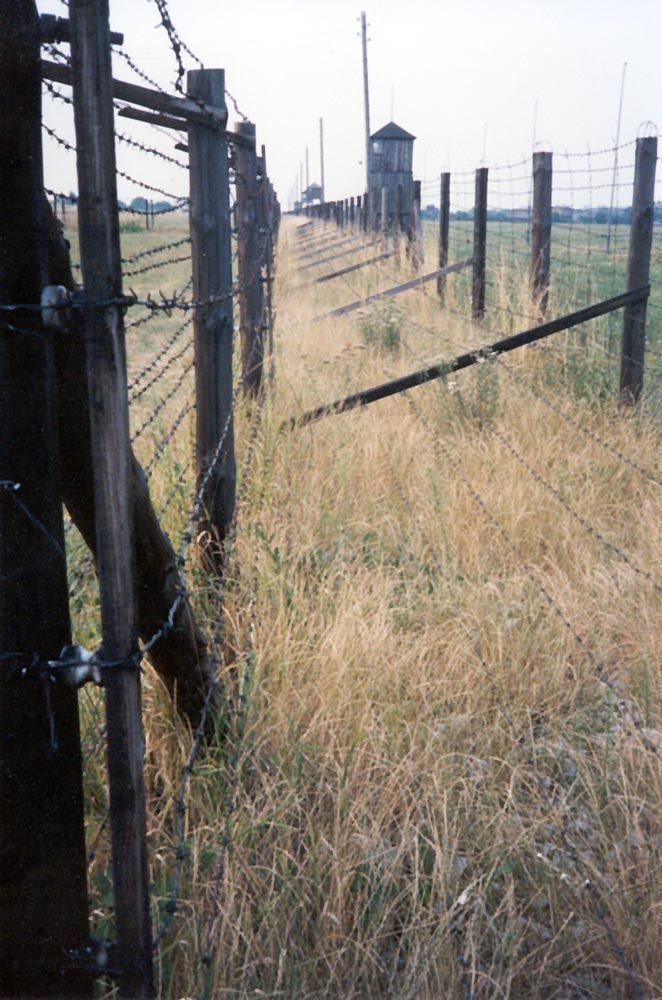A mile east of Lublin, the near-deserted grounds of the Nazi concentration camp Majdanek. A mountain of human ash is preserved, along with t