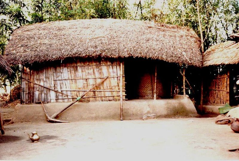 A farmstead uthan or courtyard, with implements arranged with the simplicity of a still-life.