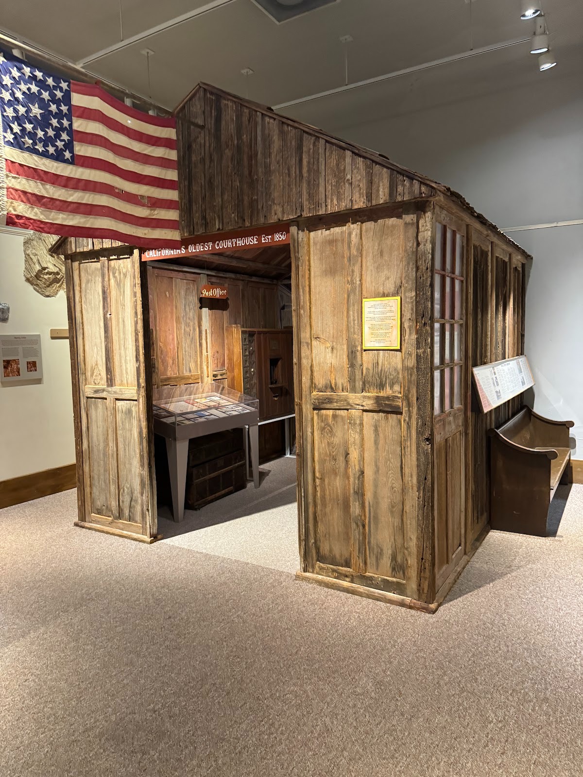 The county's first post office has been moved inside.