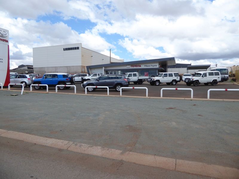 Local residents still figure they'd better be prepared, which is why this dealership sells few cars.