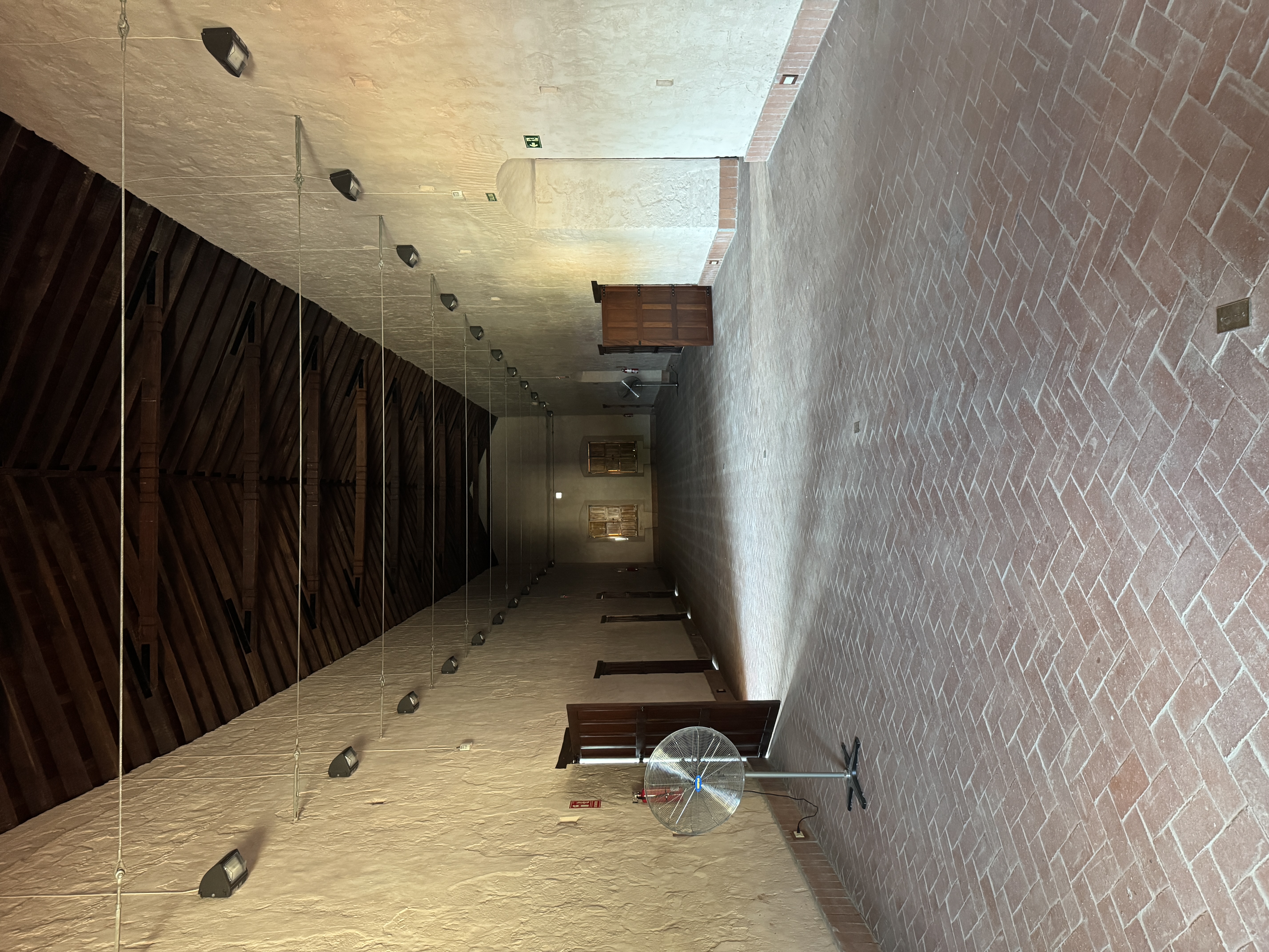 The interior is two long rooms deep, and parts are used as a museum.