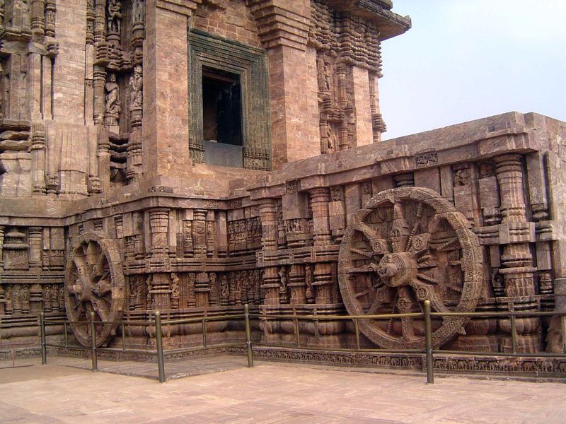 The structure simulates a temple cart riding on a dozen wheels.