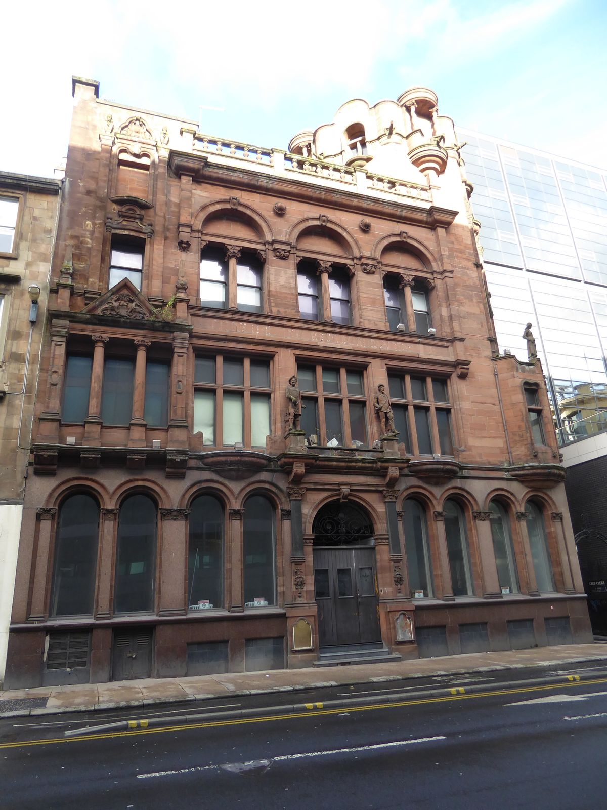 Idiosyncrasies aplenty. Here, on Waterloo Road a few blocks west of the central station is a building with three life-sized figures.