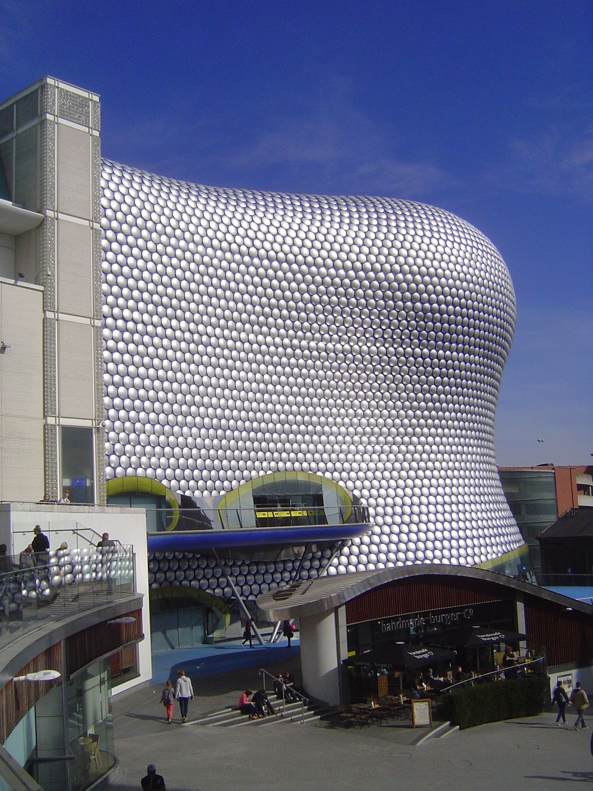 Enter Selfridge's, by Future Systems, 2001-3. Foster writes, "It is an appalling neighbour, because of its overwhelming bulk" p. 88.