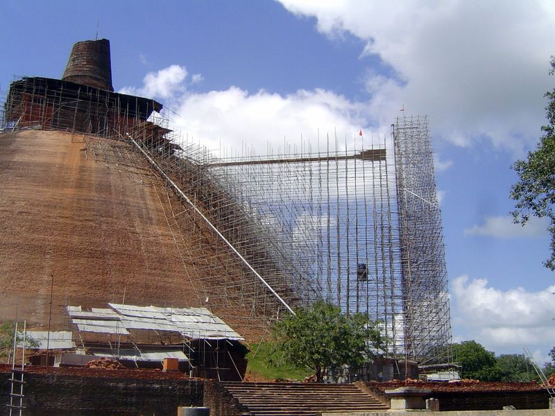 Jetavana is said to contain 93 million bricks and to be the largest brick structure in the world.

The solid object in the scaffolding is an