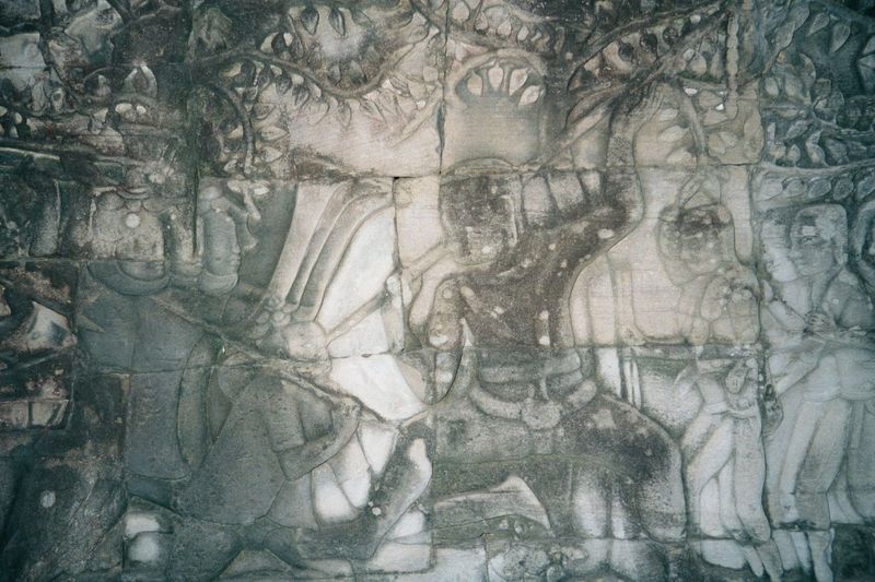 A gruesome panel, showing a spear being driven into a skull.