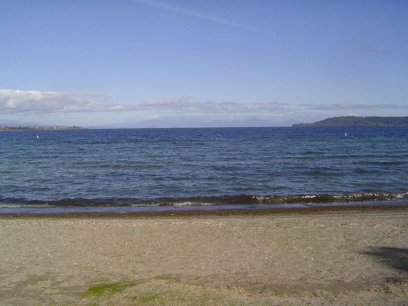 Lake Taupo is a bit bigger than Tahoe but lots warmer. A smart cookie will infer that it fills the collapsed crater of a volcano that blew i