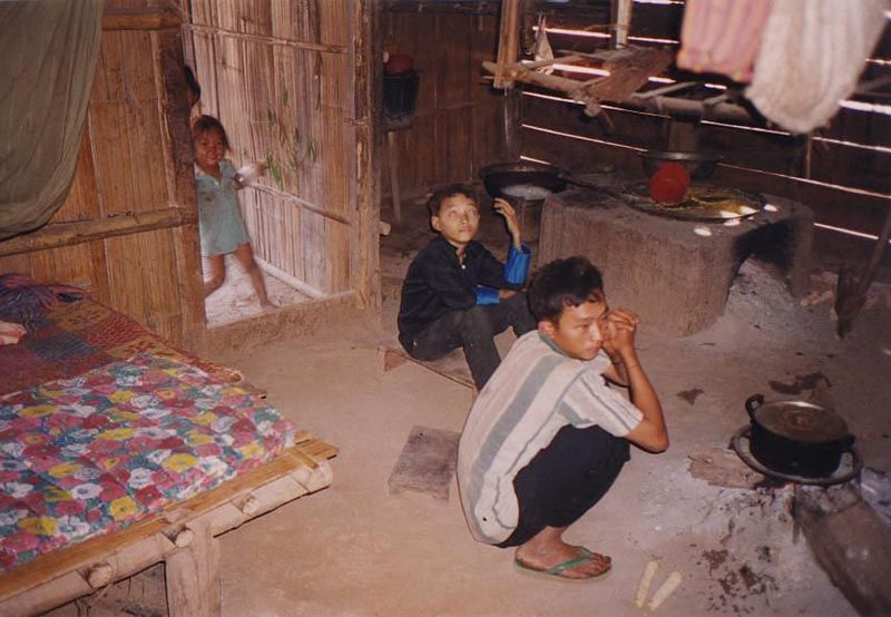 Inside, children watched a shaman attempt a cure.