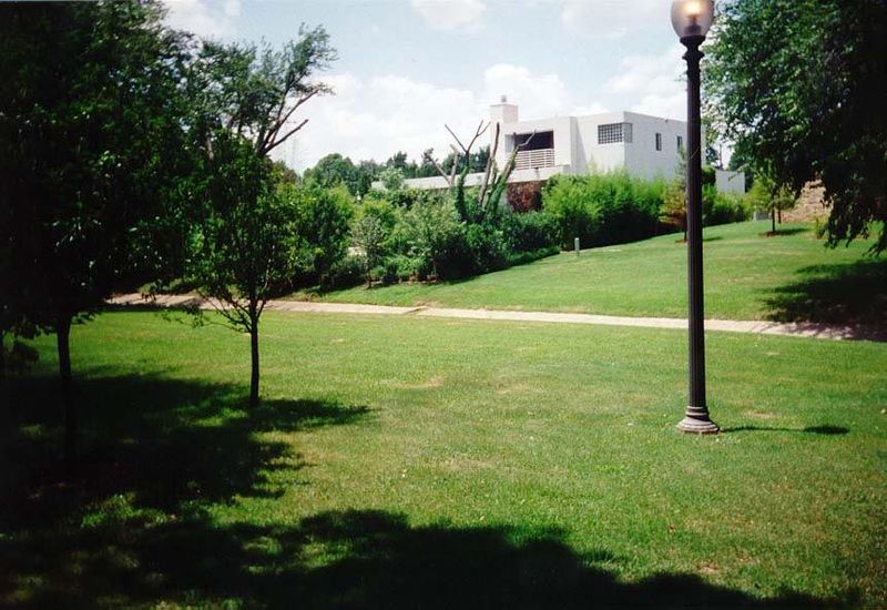 Close to the pond, a surprisingly modern home, property of a Broadway producer with Oklahoma roots. As of 2002, it was being demolished to m