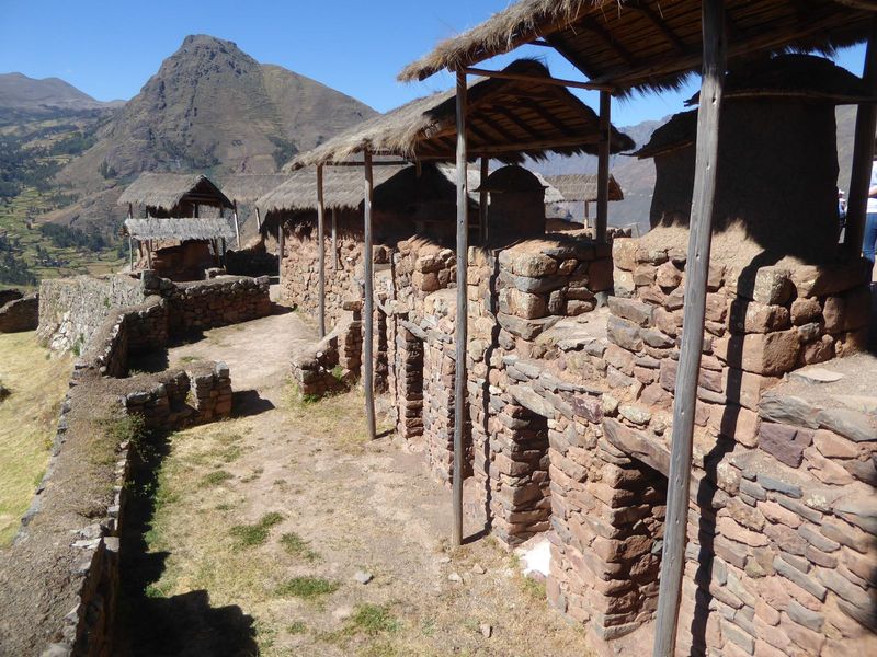 Mundane structures. The thatching is a reminder that Inca buildings even of the most perfect stonework were thatched. Odd combination: mater