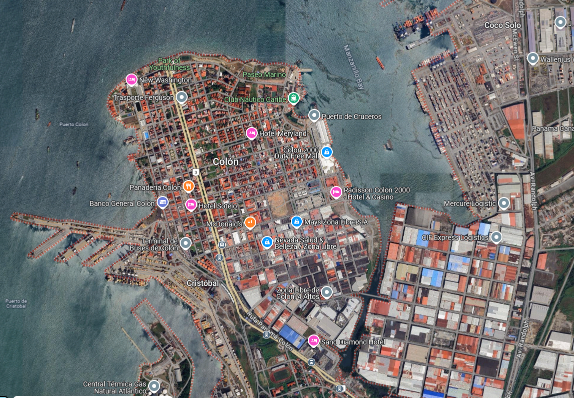 Col n today remains anchored to its port, both the old port begun by the railroad on the west you can see the projecting piers added by the 