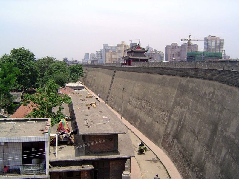 Low buildings within and high without.