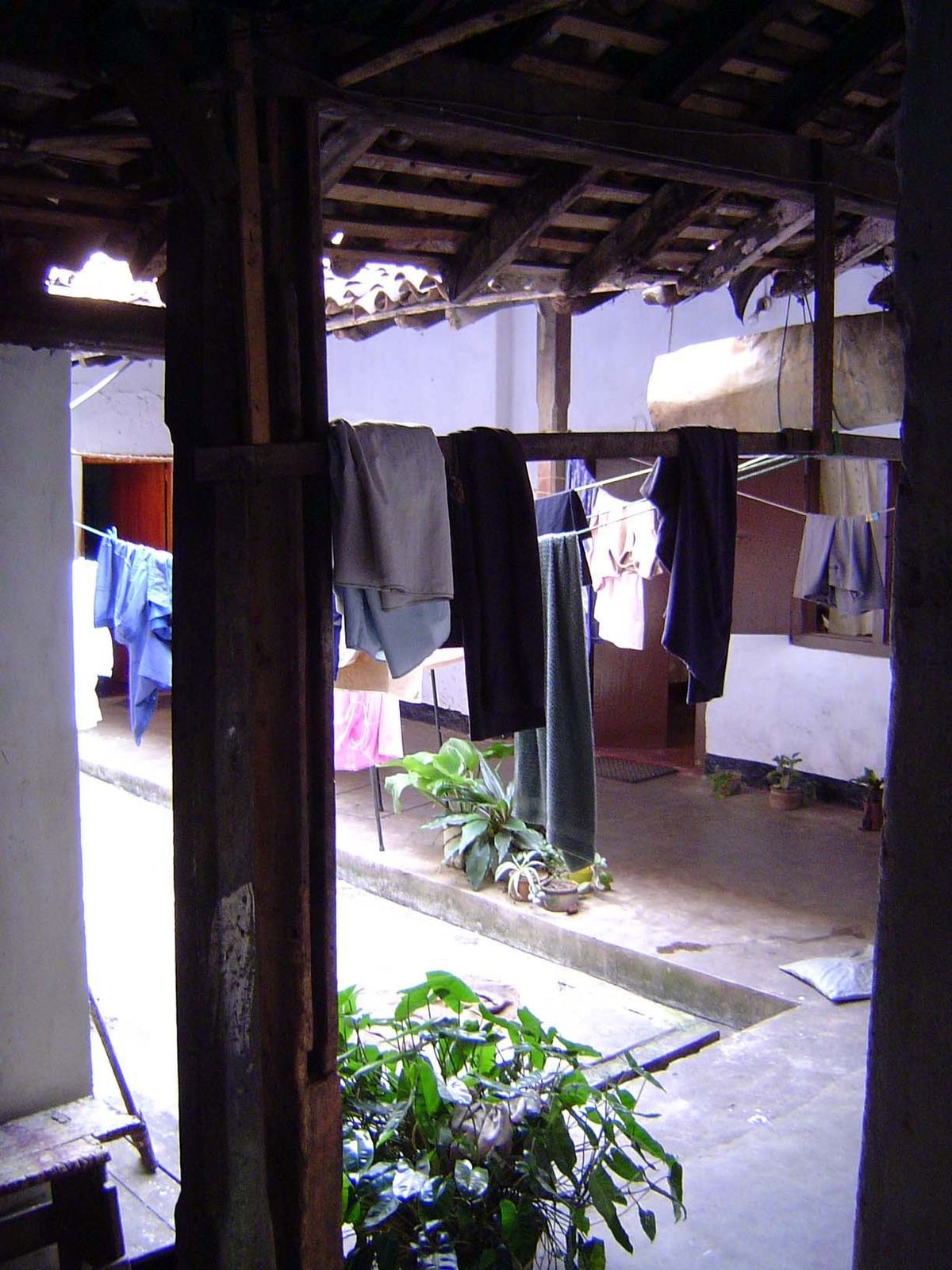 Somewhere in the house, there is a courtyard for domestic chores.