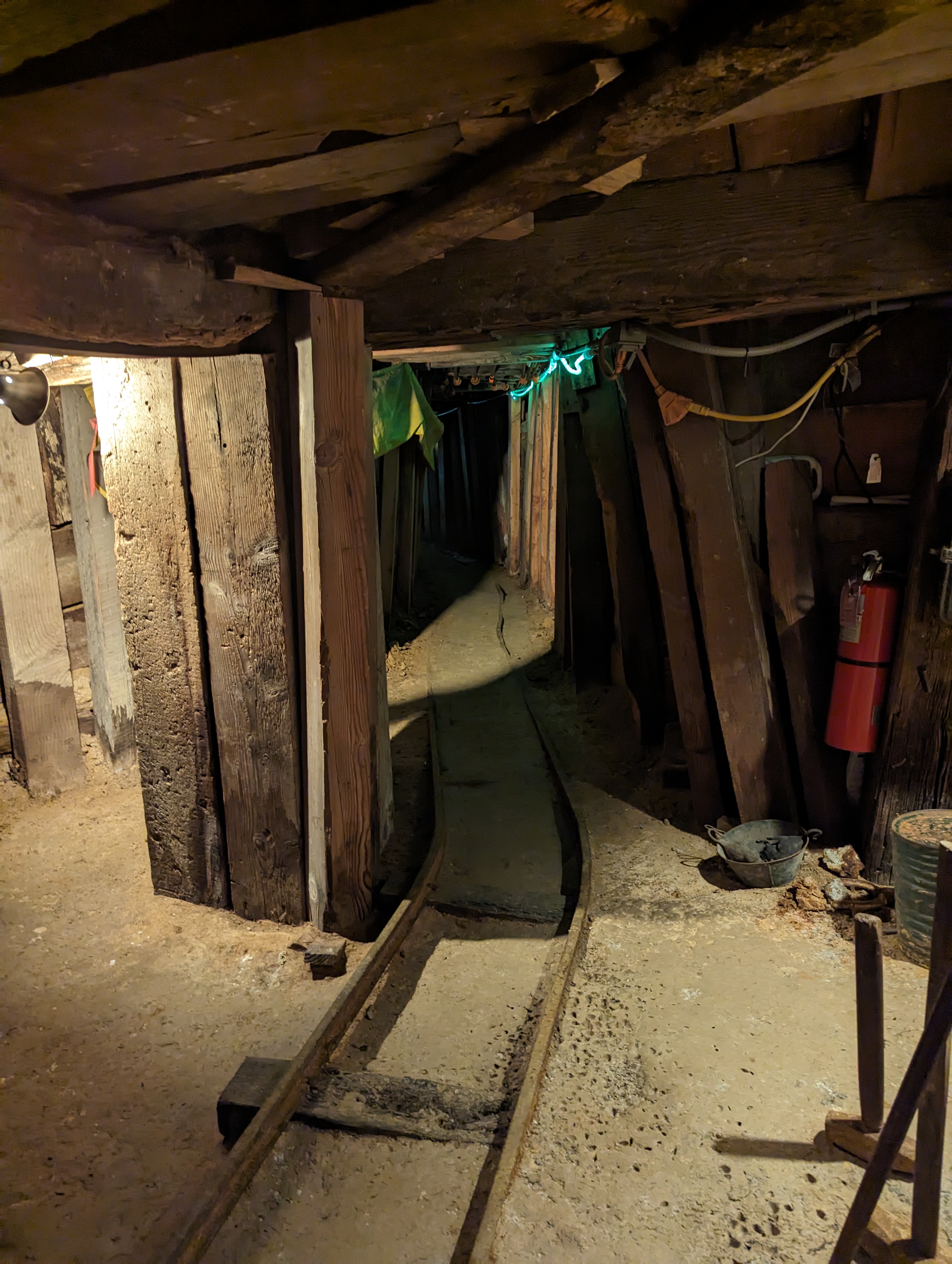 The real mine mostly operated from a shaft and, later, as an open-pit.  I don't know when or even if this tunnel was part of the working min
