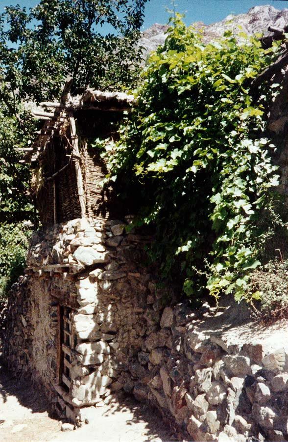 The doorway to the house is there on the left.
