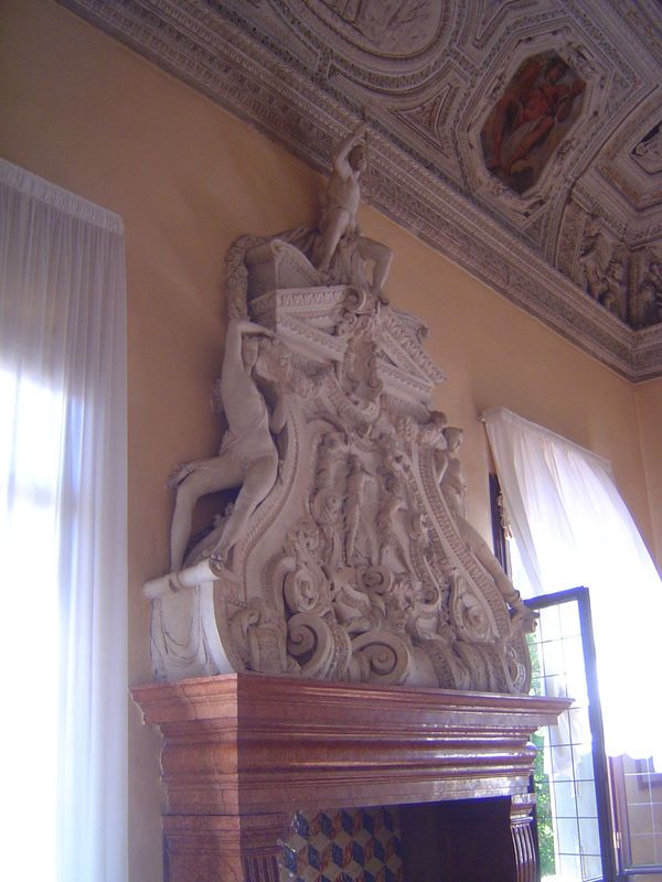 Each of the four big corner rooms has a fireplace, but each fireplace is different. This one, at the southeast corner, is of red Veronese ma