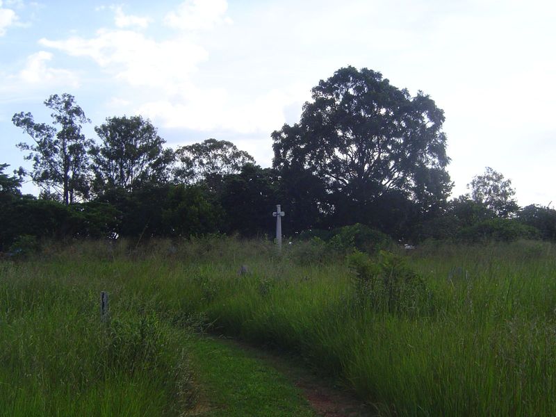 One bit of the grass has been very well tended. It's near that cross, familiar to anyone who's ever seen a Commonwealth War Graves cemetery.