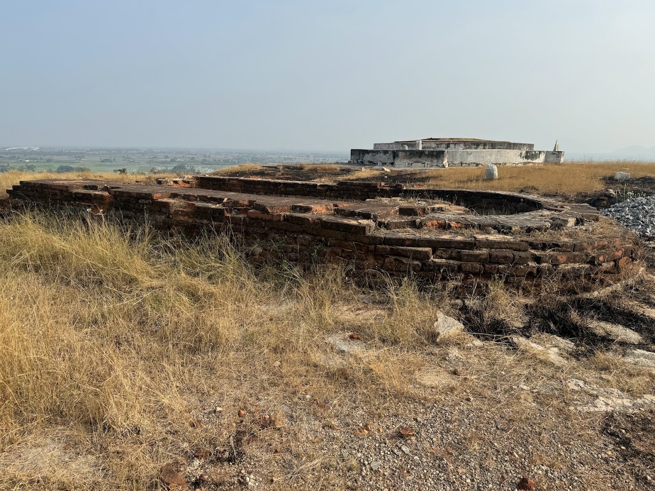 Another, plus the site's major stupa, or at least its base.
