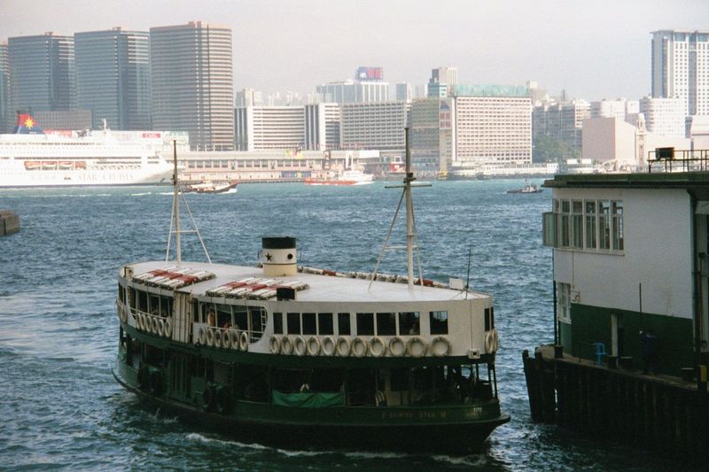 A ferry from Kowloon arrives at the Star Ferry Pier.