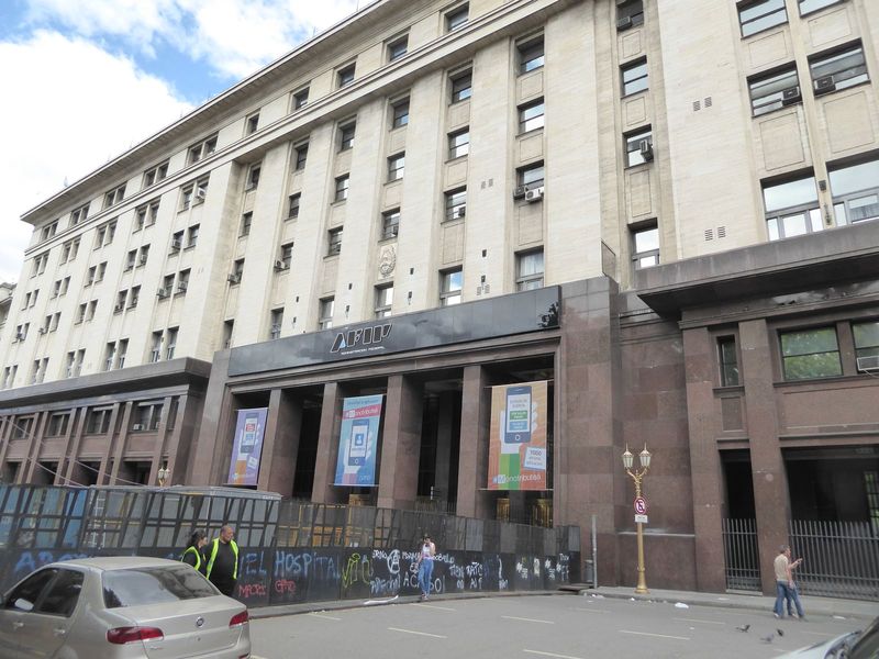Somehow the people in the nearby offices carry on, in this case in this Ministry of the Economy building from 1939. The almost indecipherabl
