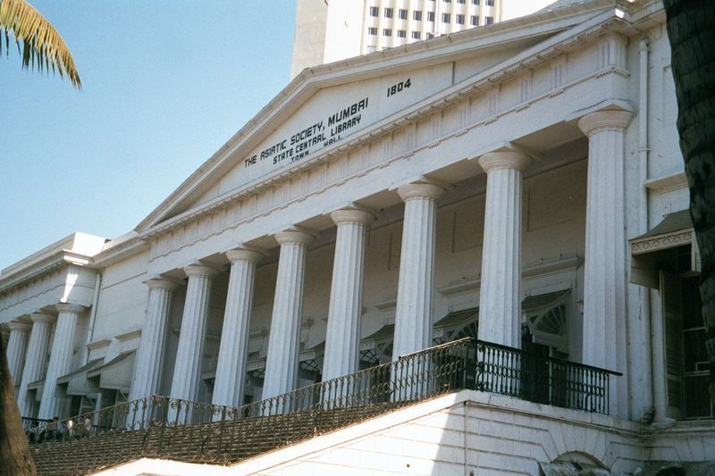 Just to the north, and fronting on Horniman formerly Elphinstone Circle, the Bombay Town Hall was begun in the 1820s and completed in 1835 t