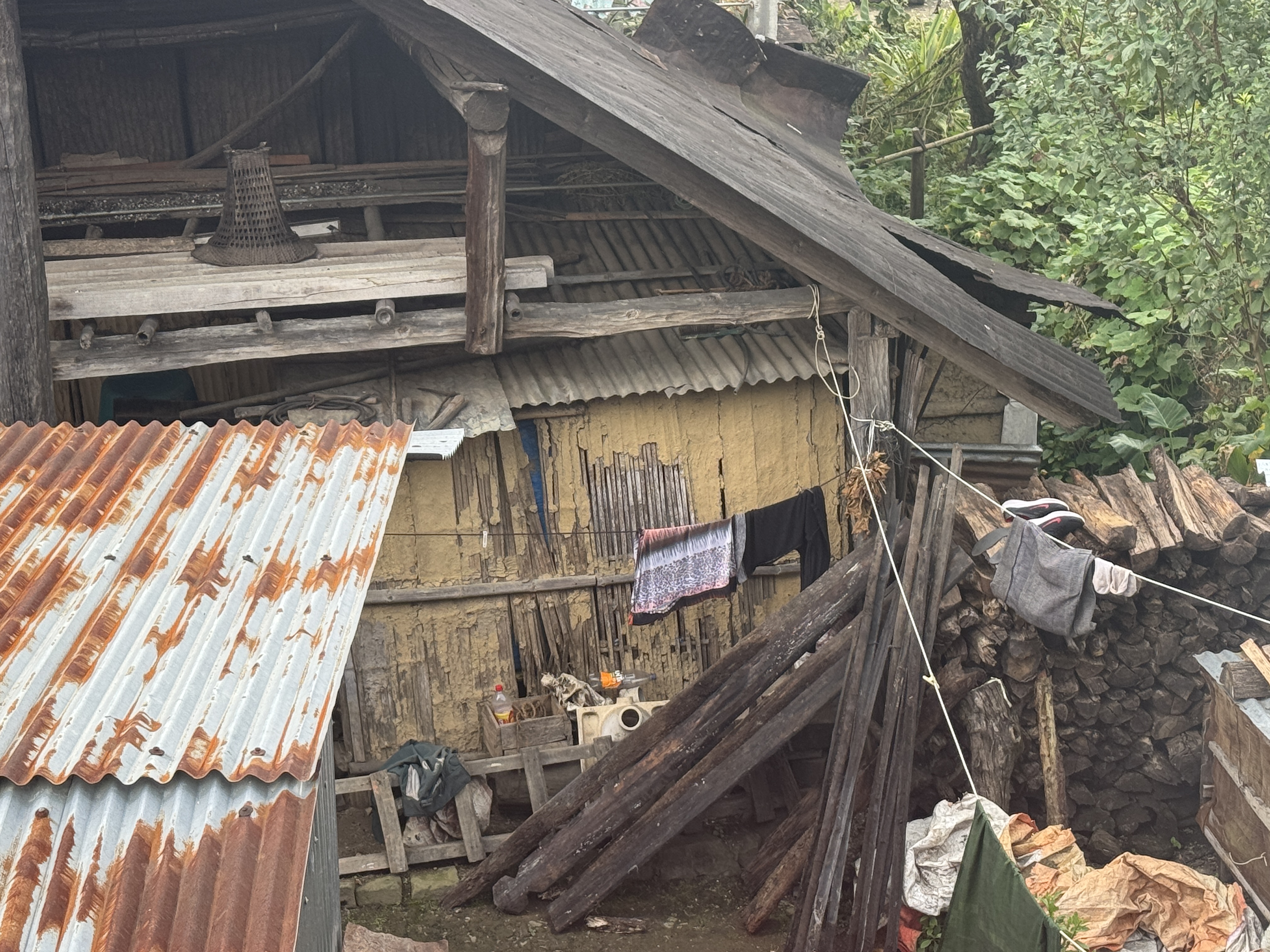 Another building with traditional walls of bamboo and mud.