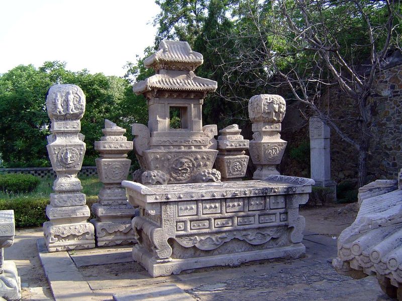 An altar carved to resemble a cabinet.