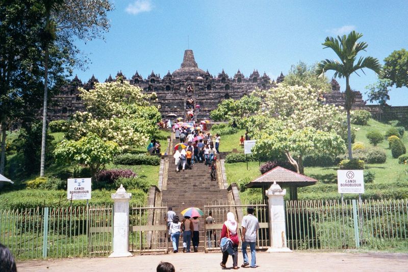 Borobudur is a four-sided pyramid, with four square platforms nested atop one another and topped by three near-circular ones. The east side,