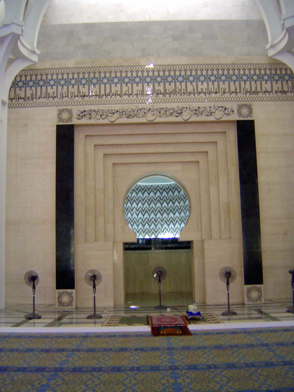 Prayer niche, with floor fans.