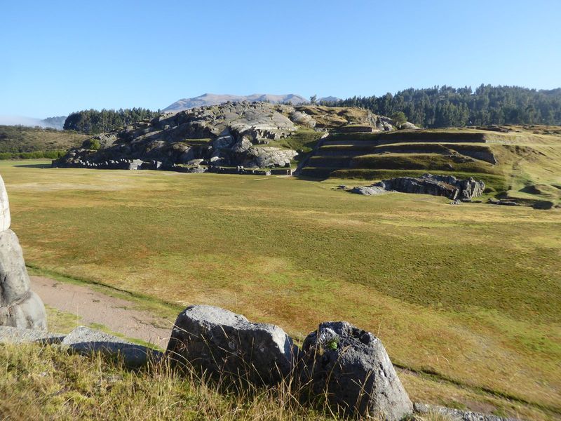 Still farther up the hill is Sacsayhuaman. We're standing atop it and looking across an Inca parade ground to a second hill, called the Roda