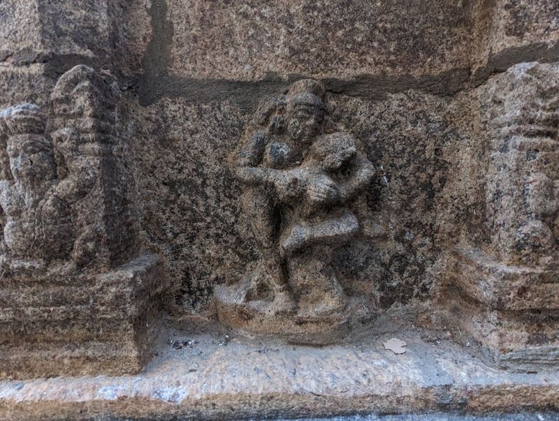 Ah, a mithuna, a reminder on the temple's wall of what Stella Kramrisch calls "reintegration." So easy to forget, so hard to remember.