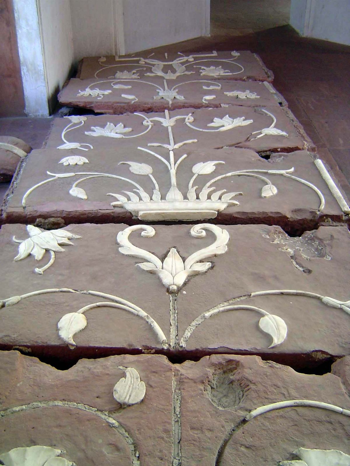 Some discarded marble-inlaid sandstone.