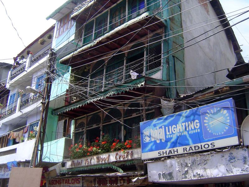 Several floors are stacked atop the shops.