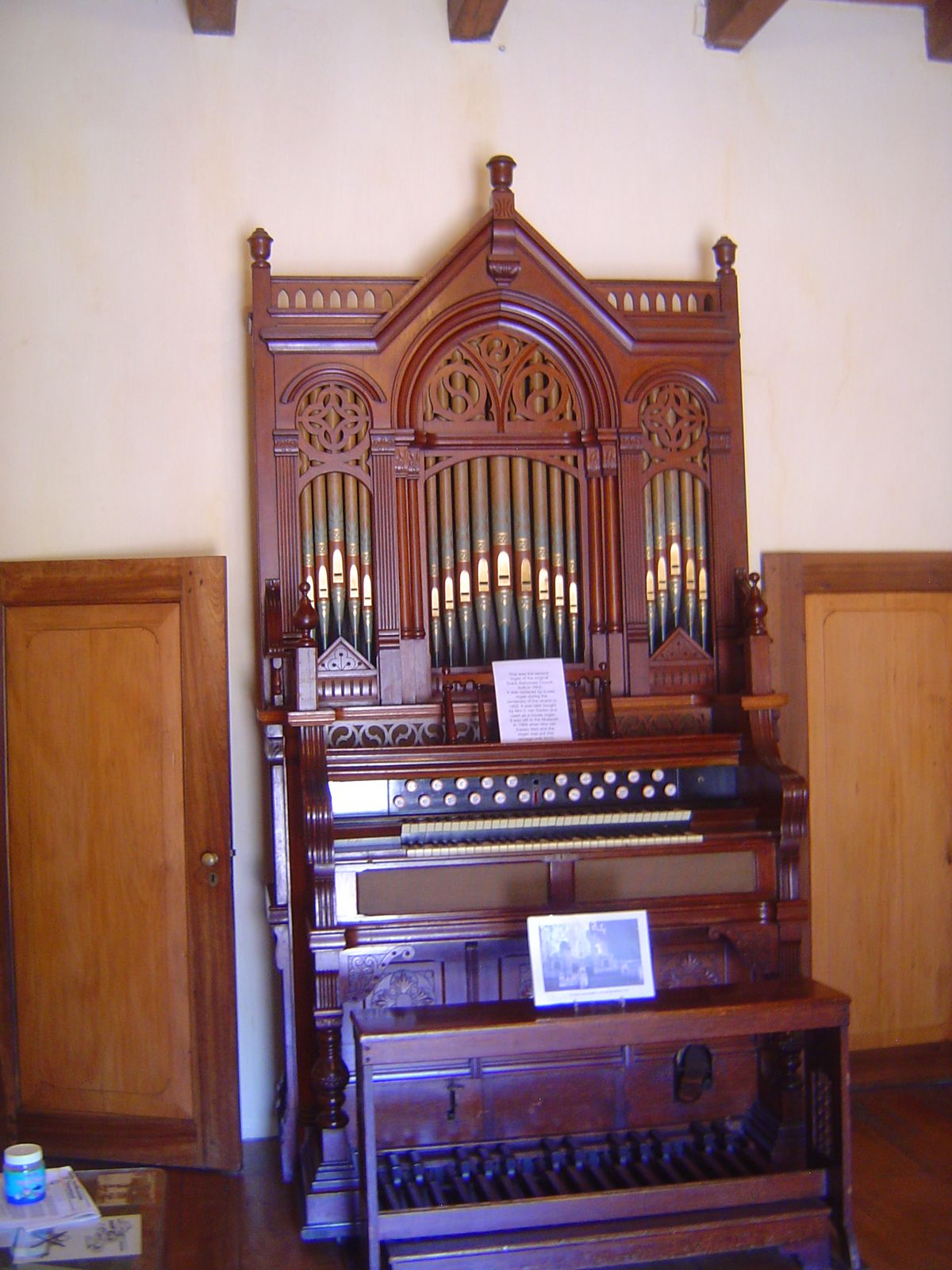 Inside, a fine old cabinet organ.