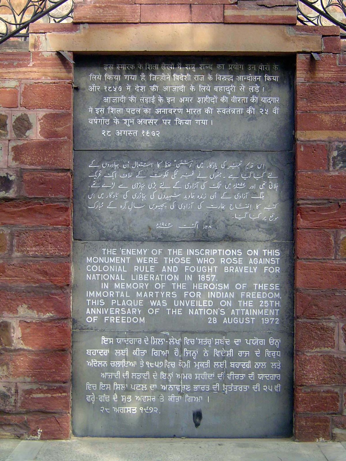 A plaque rewrites the history inscribed in 1863 by the British.