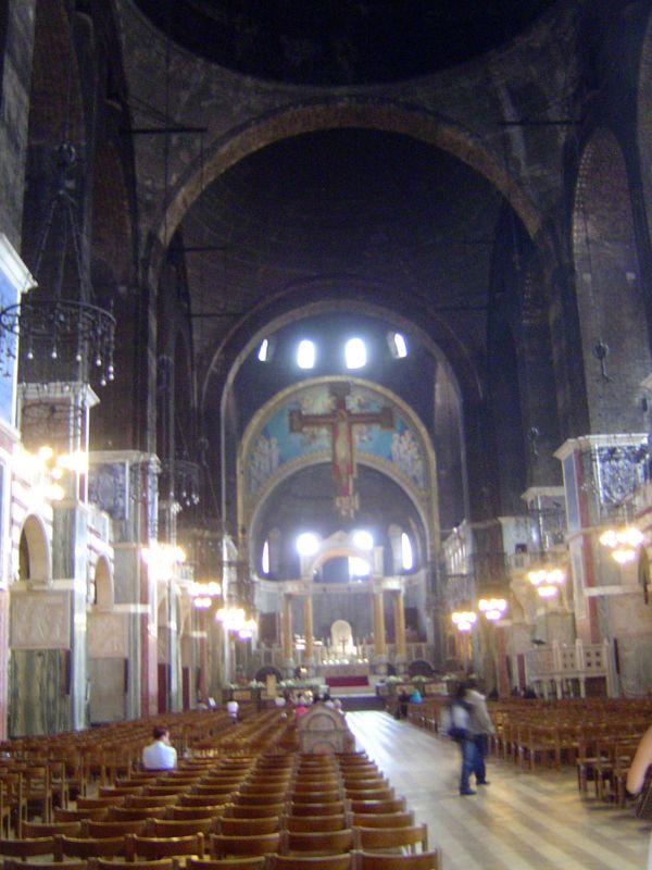 The interior recalls Hagia Sophia, which Bentley never saw. He did visit S. Vitale in Ravenna, and he wrote that it, along with Hagia Sophia