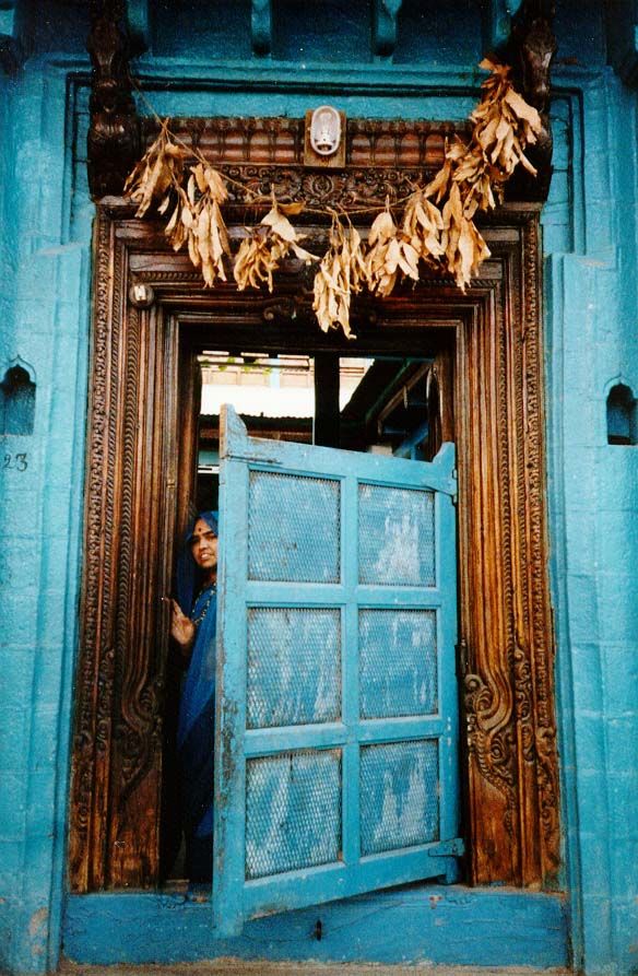 A bit farther west, in Shorapur not Sholapur. This is a typical house design, with a swinging screen door leading from the street to a court
