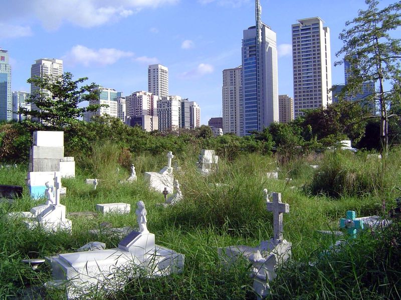 Some of the homeless, with Makati in the background.